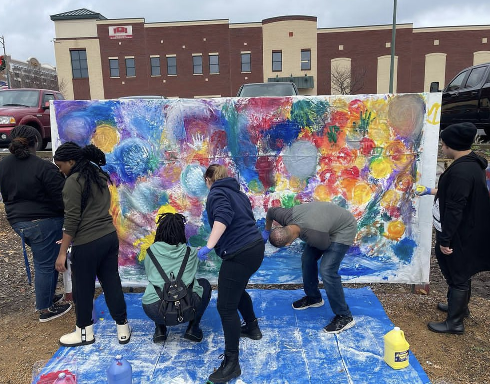 Students Work Together on the Community Mural